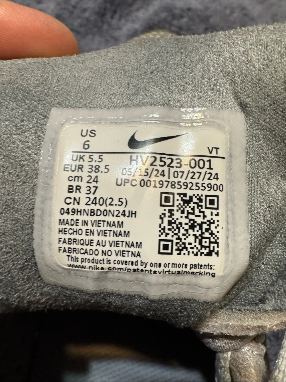 Nike Gray Shoe Size Label with Black Swoosh